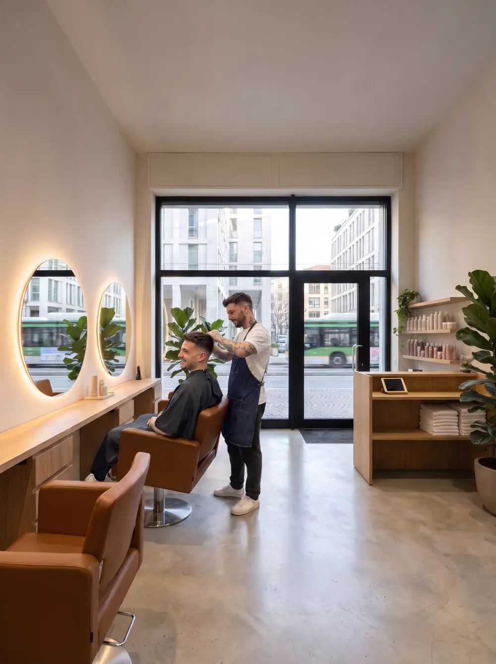 Client in the chair while the stylist checks his short cut
